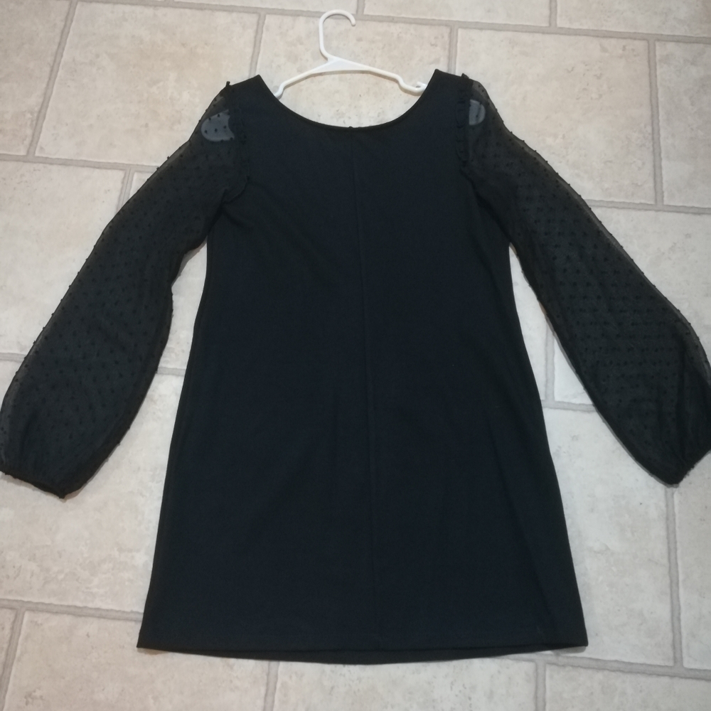 Unique little black dress!
